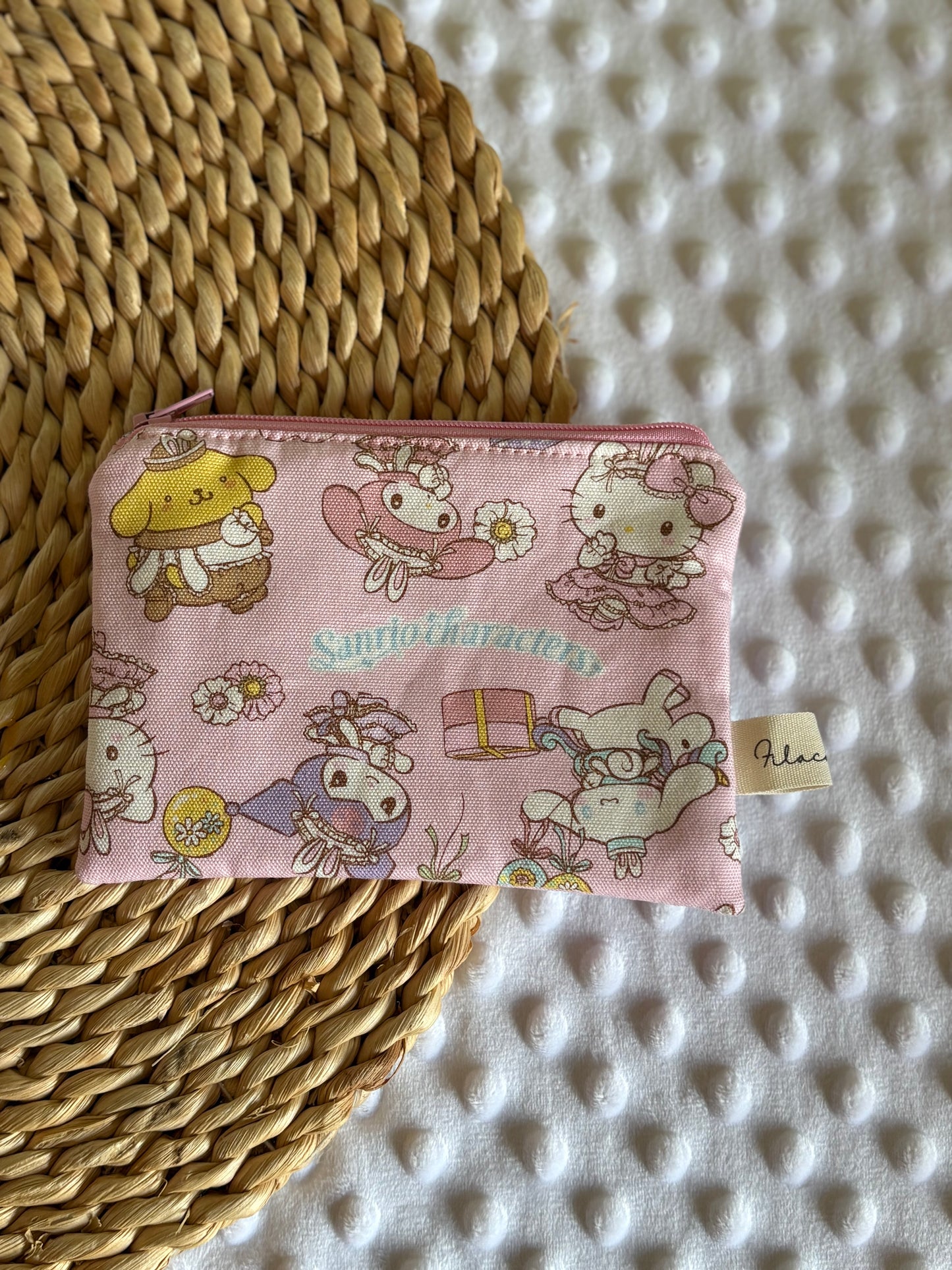 Monederos Pokemon y Sanrio